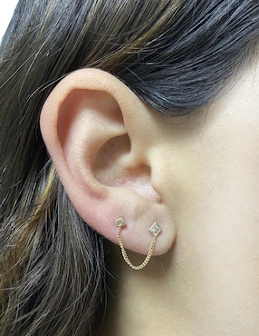 Piercing Mancini de oro con acabado brillante zirconia