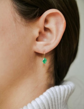 Aretes de óvalo Mancini de oro amarillo 10 K con acabado liso ágata