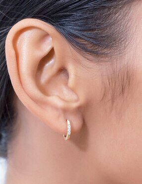Aretes redondos Riccardo Orsato de oro con acabado brillante diamante