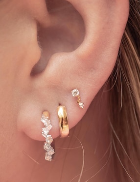 Piercing de rayo Ingrata Fortuna de oro con acabado espejo diamante