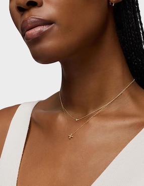 Collar de cruz Tous de oro amarillo 18 K