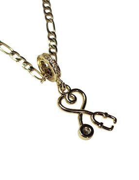 Collar con dije Limerence By Claudia Herrera Estetoscopio de oro laminado 14 K