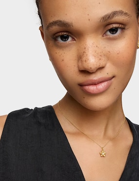 Dije de flor Tous daisy de oro amarillo 18 K