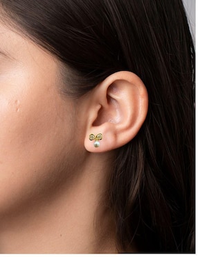 Broqueles de moño Mardia de oro 14 K con acabado pavé zirconia