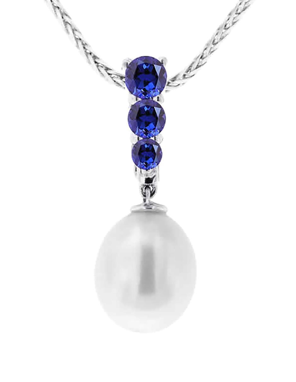 Dije de oro blanco 14 K zafiro y perla