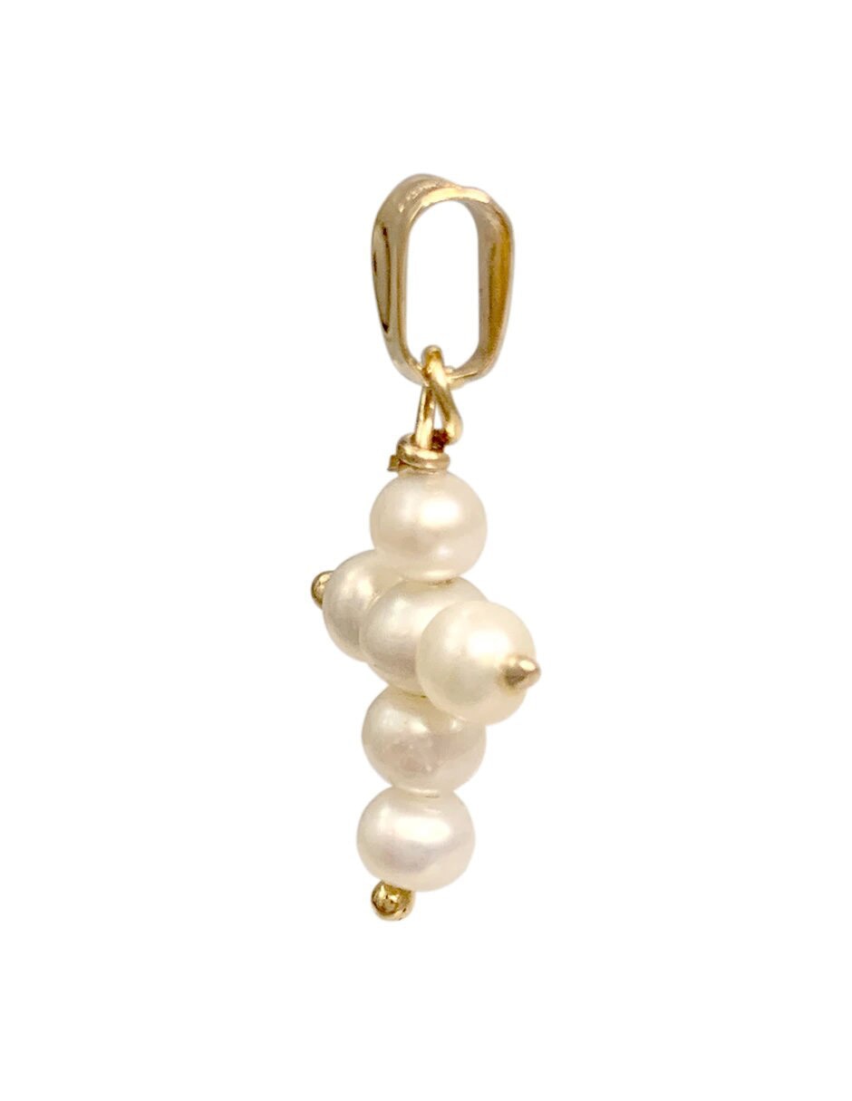 Dije de cruz de oro amarillo 14 K perla
