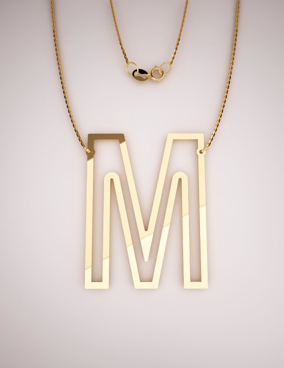 Dije de letras personalizable de oro 14 k