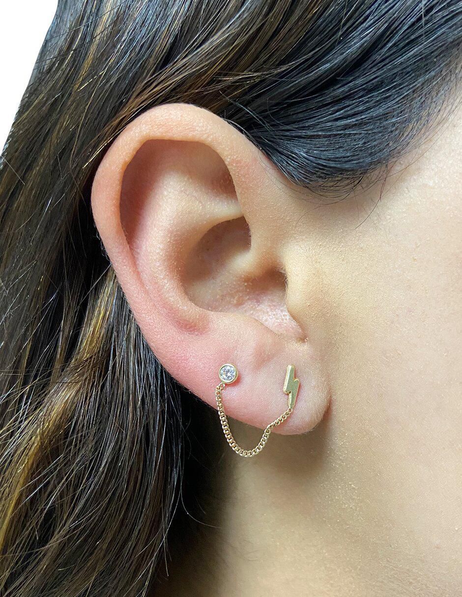 Piercing de oro con acabado brillante zirconia 2