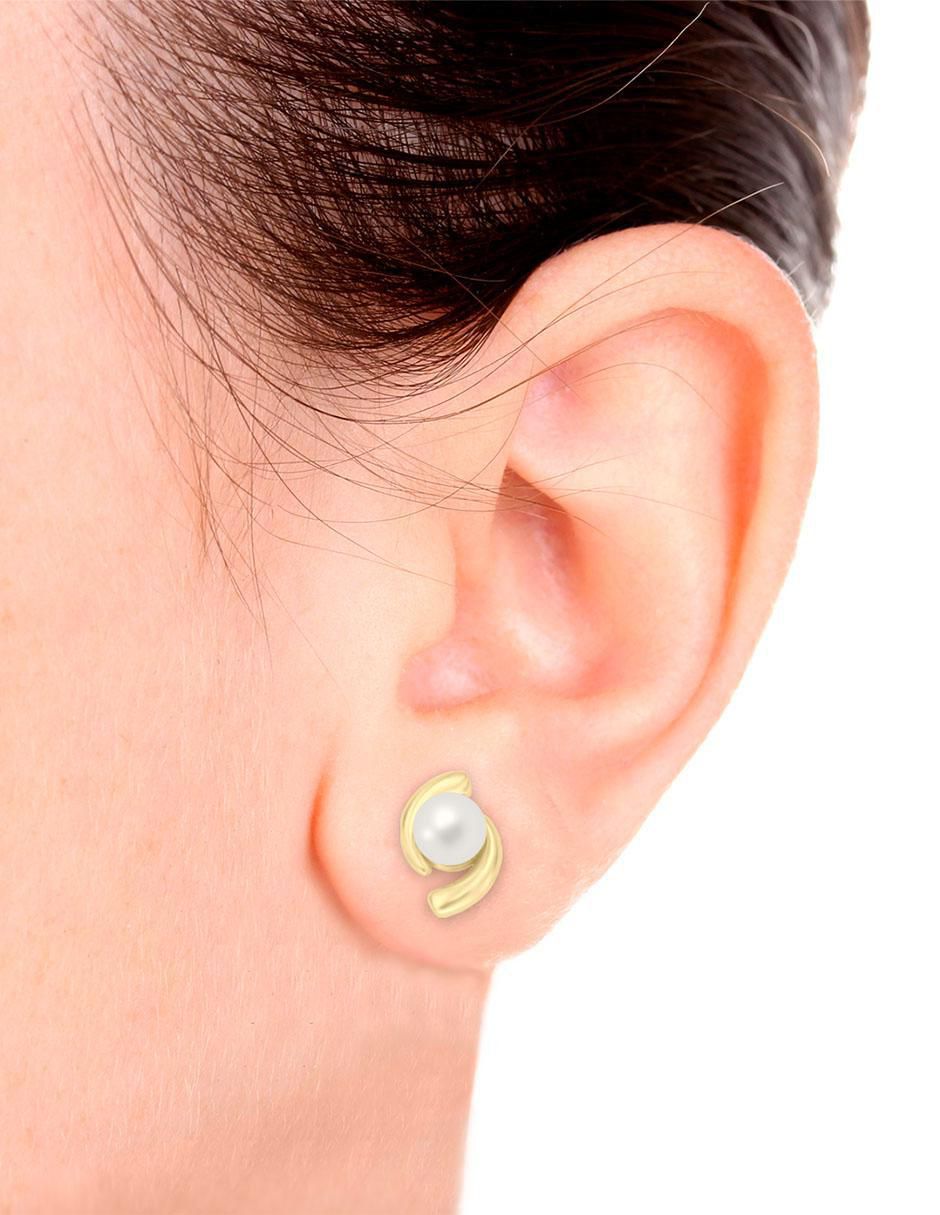 Aretes Equilibrio de oro amarillo con acabado brillante perla 3