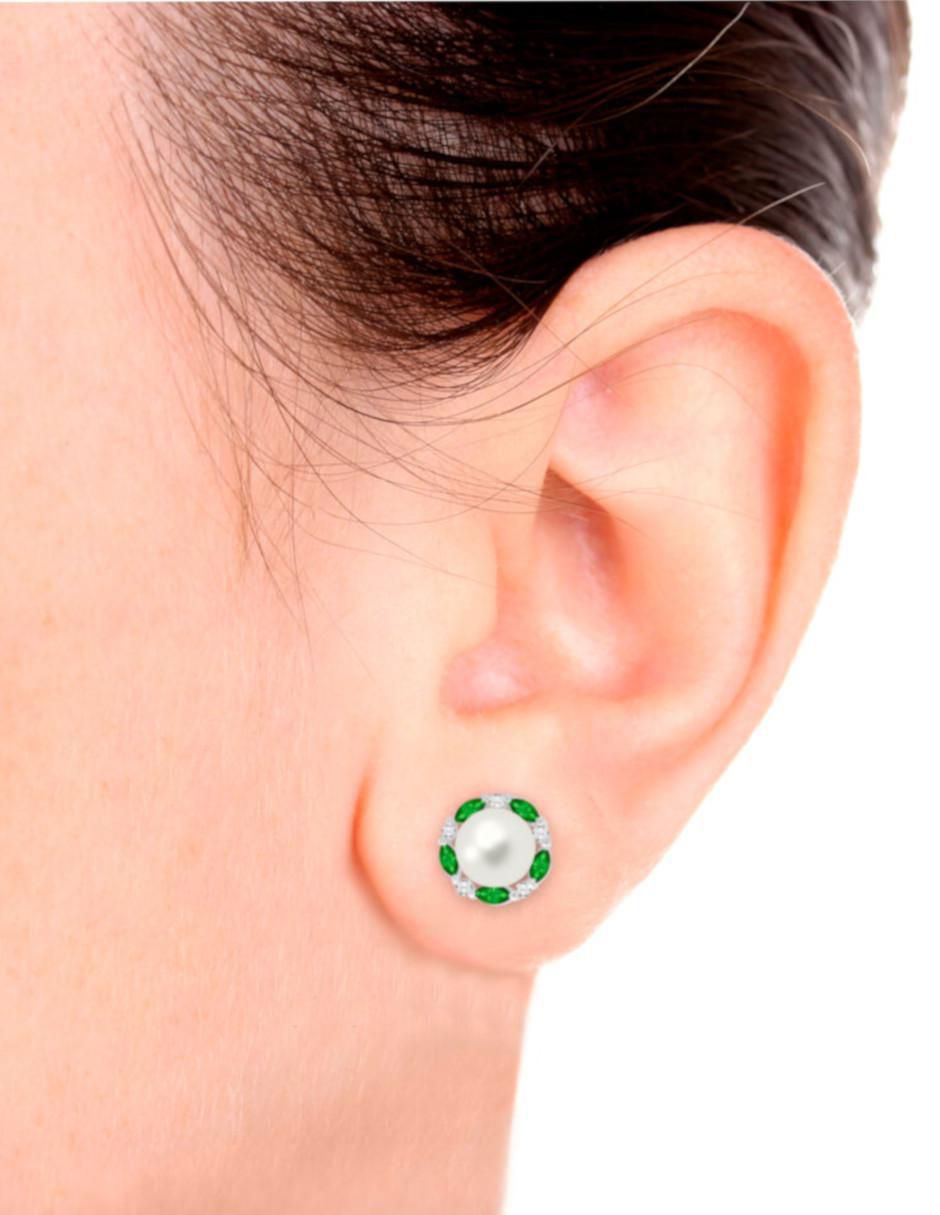 Aretes redondos Coco de oro blanco con acabado brillante perla y esmeralda 3