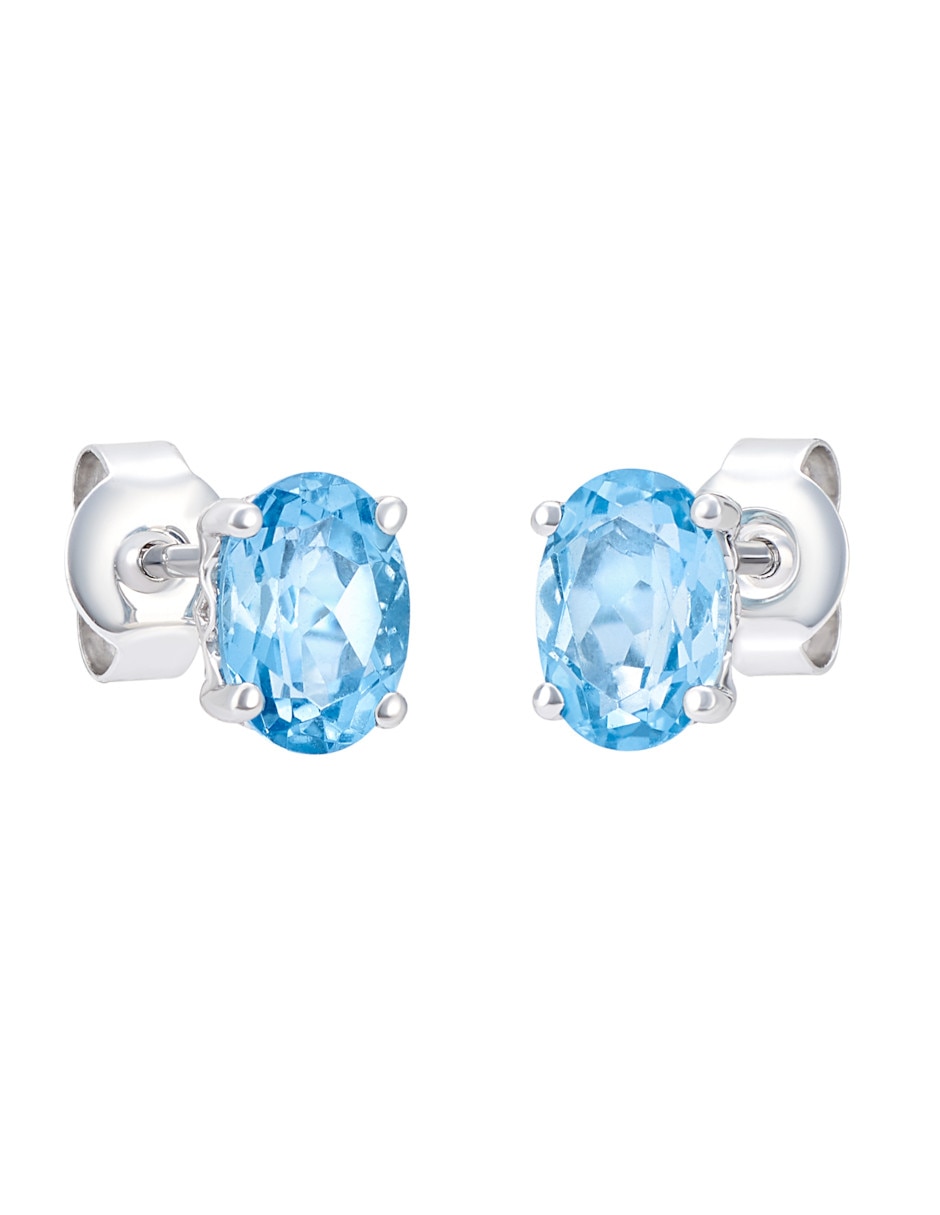 Broqueles de oro blanco 14 K topacio azul de londres Broqueles de oro blanco 14 K topacio azul de londres