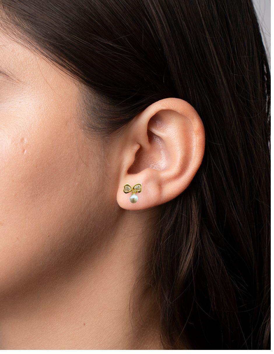 Broqueles de moño de oro 14 K con acabado pavé zirconia 2