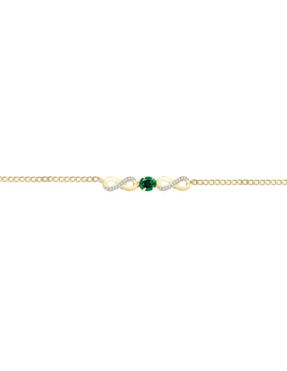 Pulsera de oro con diamante y esmeralda 14 k con acabado brillante